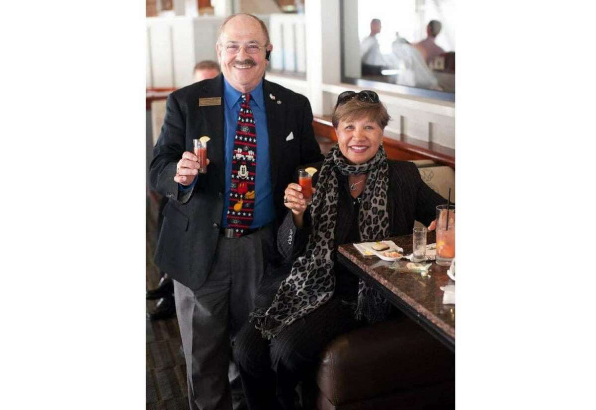 Marshall Mitzman (left) and wife Felie Ulep-Mitzman, in 2012 at Skates Restaurant on the Bay in Berkeley.