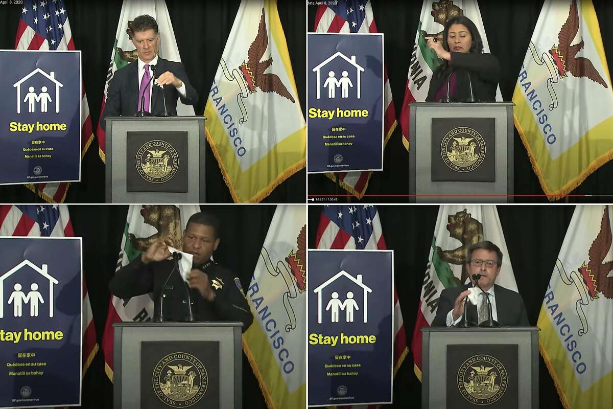 A screenshot from YouTube of San Francisco officials clean off shared microphone off with alcohol wipes during a "virtual press conference" on April 8, 2020 where they provide updates on the city's response to COVID-19. From upper left clockwise: Dr. Grant N. Colfax, San Francisco Mayor London Breed, Michael Pappas, executive director of SF interfaith council is the guy and San Francisco Police Chief Bill Scott