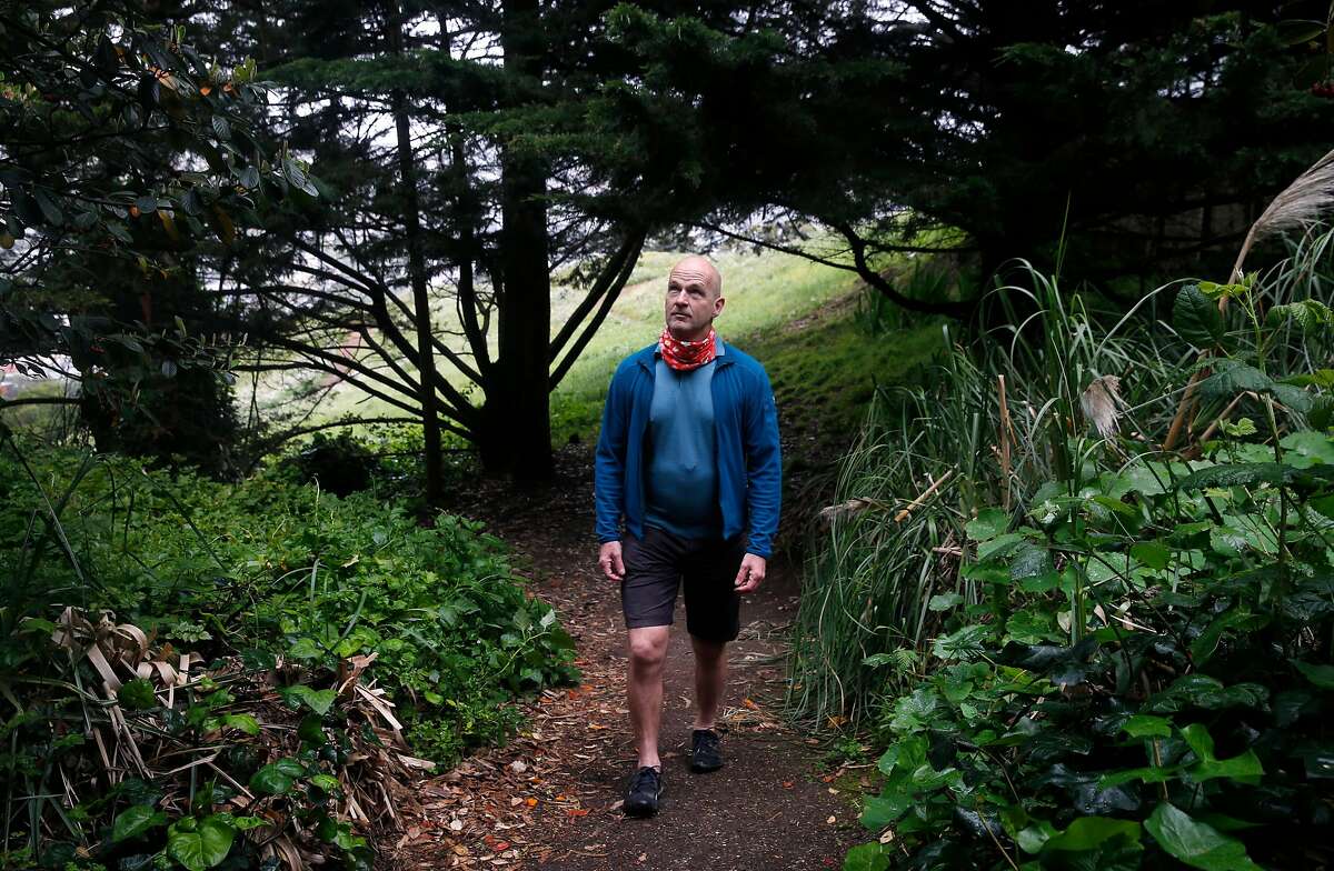 Shundo David Haye walks in solitude on the trails of Kite Hill during the coronavirus pandemic in San Francisco, Calif. on Thursday, April 16, 2020.