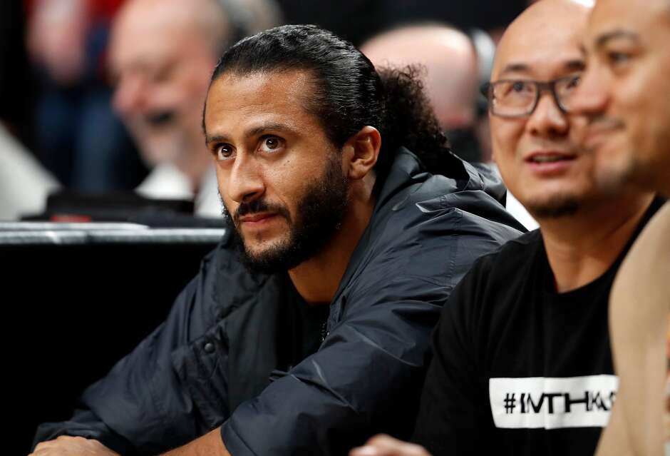 Colin Kaepernick watches during Golden State Warriors' 119-117 overtime win over Portland Trail Blazers in NBA Western Conference Finals' Game 4 at Moda Center in Portland, Oregon on Monday, May 20, 2019.