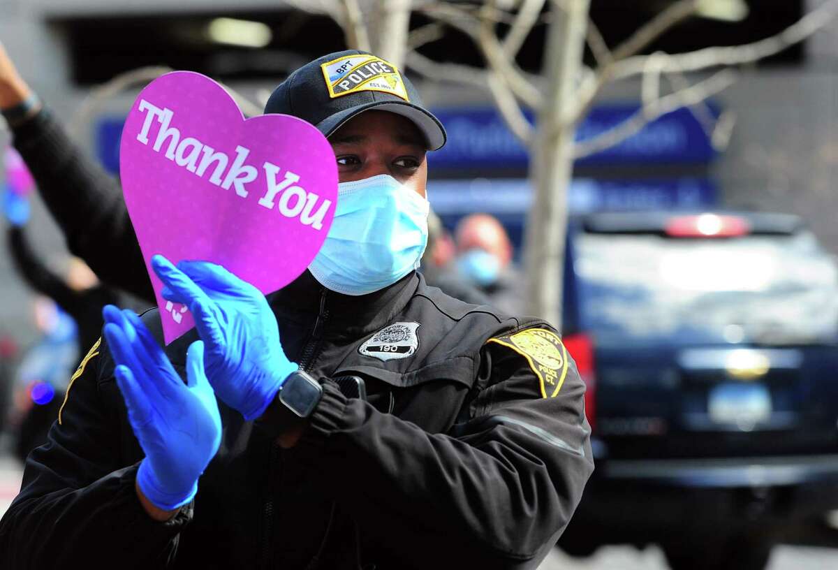 Bridgeport Hostpital health care workers were honored by dozens of first responders who arrived in a parade to thank them for their hard work fighting the coronavirus pandemic in Bridgeport, Conn., on Thursday Apr. 16, 2020.