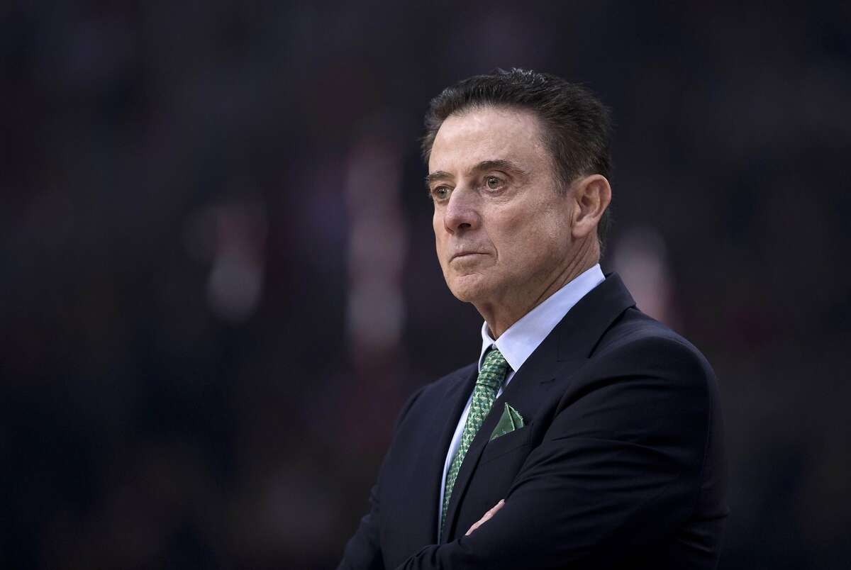 File-This Jan. 4, 2019, file photo shows Panathinaikos coach Rick Pitino looking on during a Euroleague basketball match between Panathinaikos and Olympiakos in Piraeus near Athens. Former Louisville basketball coach Pitino has reached a settlement with Adidas, the Hall of Fame coach and the global sportswear company said in a joint statement Monday, Dec. 23, 2019. (AP Photo/Petros Giannakouris, File)