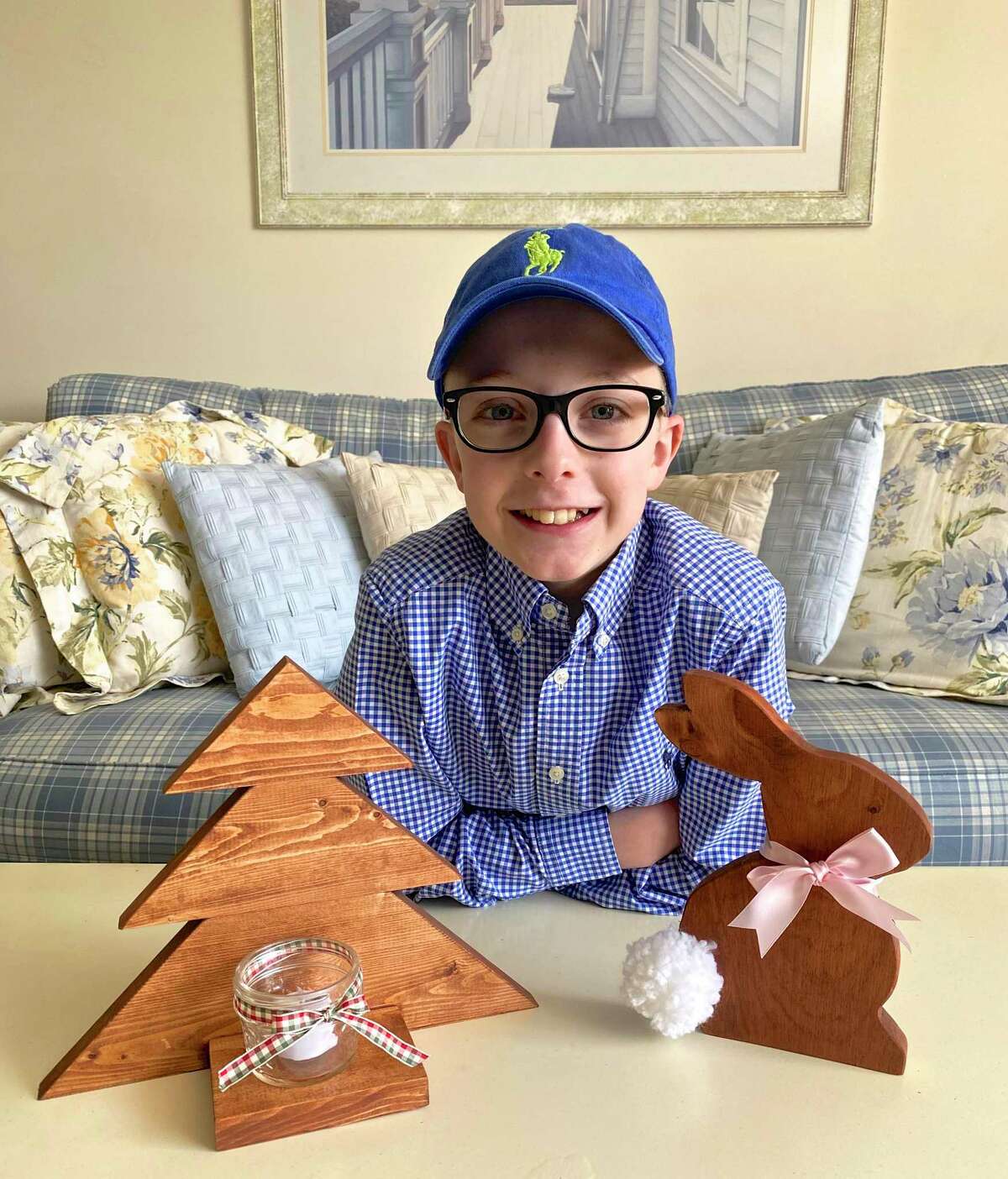 Frankie DeMunda, a Danbury 12-year-old, creates and sells wooden items, with a portion of the proceeds going towards causes, including providing meals to workers at Danbury Hospital.