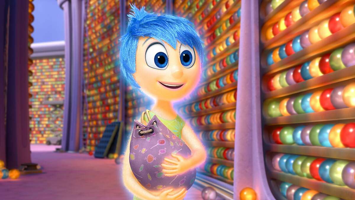 In this image released by Disney-Pixar, the character Joy, voiced by Amy Poehler, appears in a scene from "Inside Out," in theaters on June 19. (Disney-Pixar via AP)