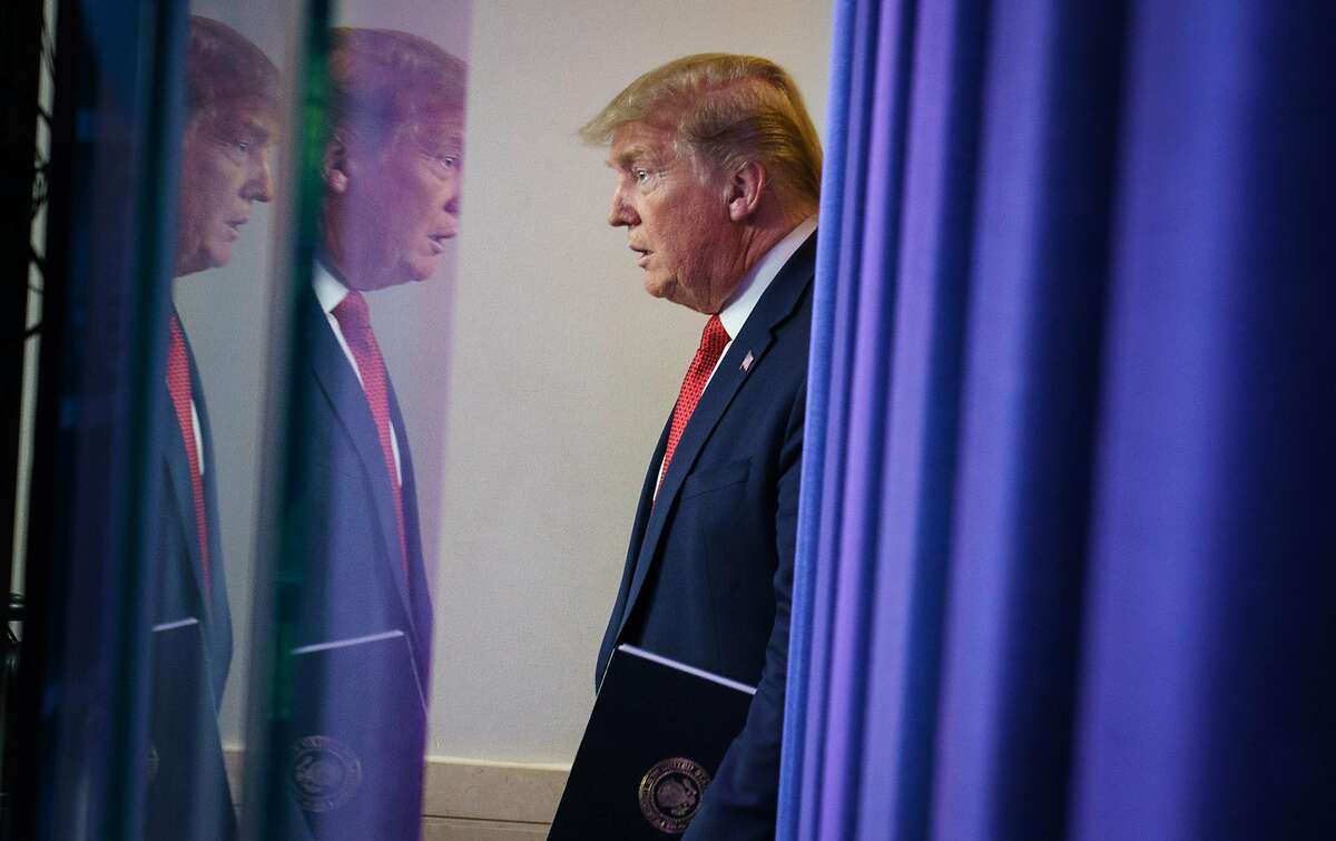 (FILES) In this file photo taken on April 16, 2020 US President Donald Trump arrives for the daily briefing on the novel coronavirus, which causes COVID-19, in the Brady Briefing Room of the White House in Washington, DC. - President Donald Trump on April 17, 2020 said China's real death toll from coronavirus was "far higher," even after officials issued a new count doubling the number of dead in Wuhan, where the pandemic began. "China has just announced a doubling in the number of their deaths from the Invisible Enemy. It is far higher than that and far higher than the U.S., not even close!" Trump tweeted. (Photo by MANDEL NGAN / AFP) (Photo by MANDEL NGAN/AFP via Getty Images)