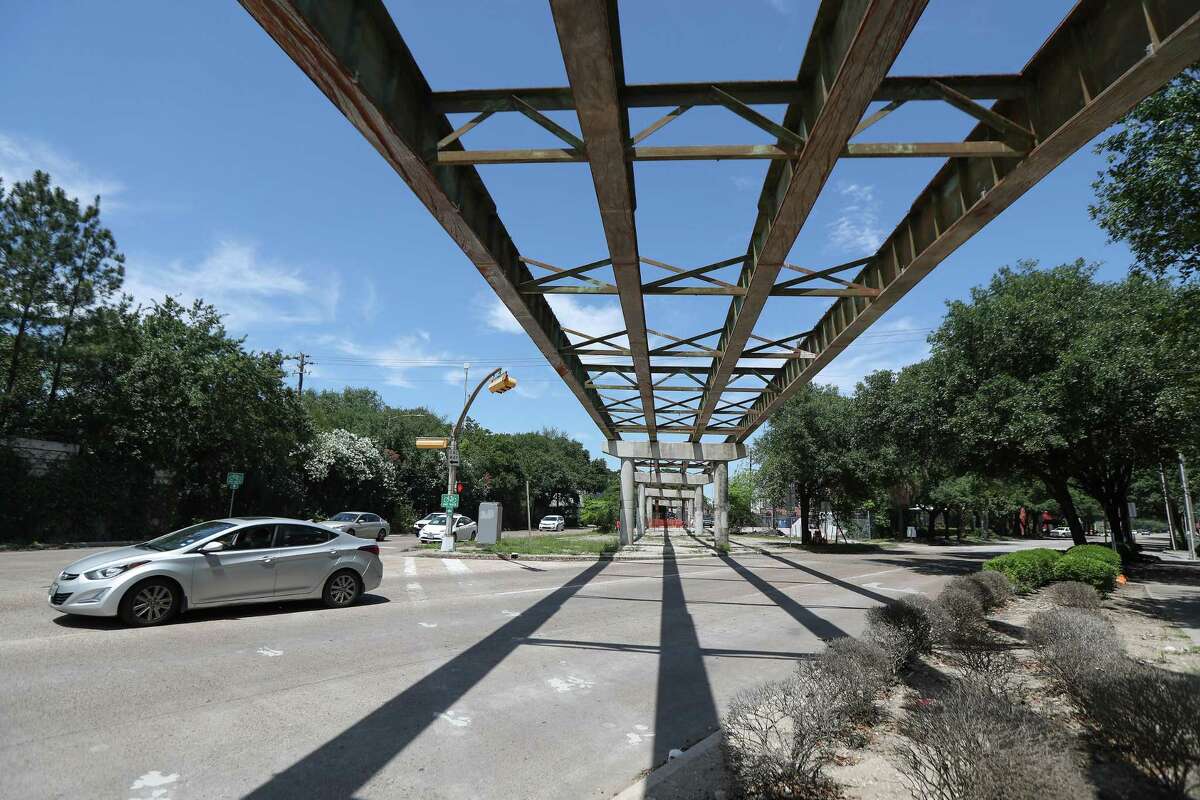 City officials planned a pedestrian trail as a replacement for connections from Bagby and Brazos to Spur 527, rather than replace the old bridge, the girders of which hang above the streets on April 15, 2020, in Midtown Houston.