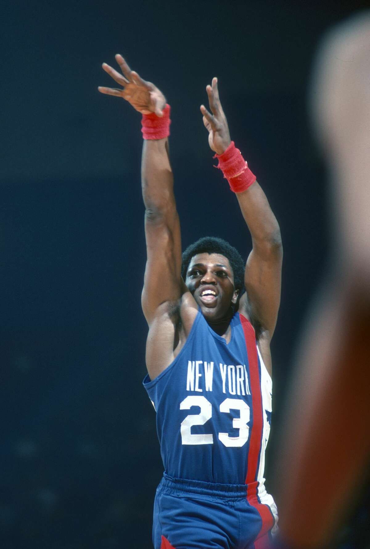 LANDOVER, MD - CIRCA 1978: John Williamson #23 of the New Jersey Nets shoots against the Washington Bullets during an NBA basketball game circa 1978 at the Capital Centre in Landover, Maryland. (Photo by Focus on Sport/Getty Images)