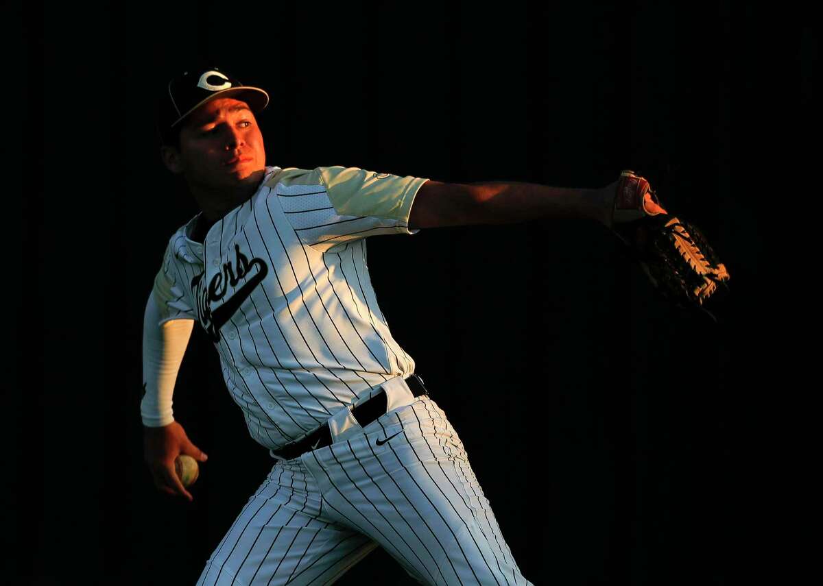 Luke Ramirez #16 of Conroe warms up before a high school baseball game against The Heights during the Ferrell Classic at Conroe High School, Thursday, March 5, 2020, in Conroe.