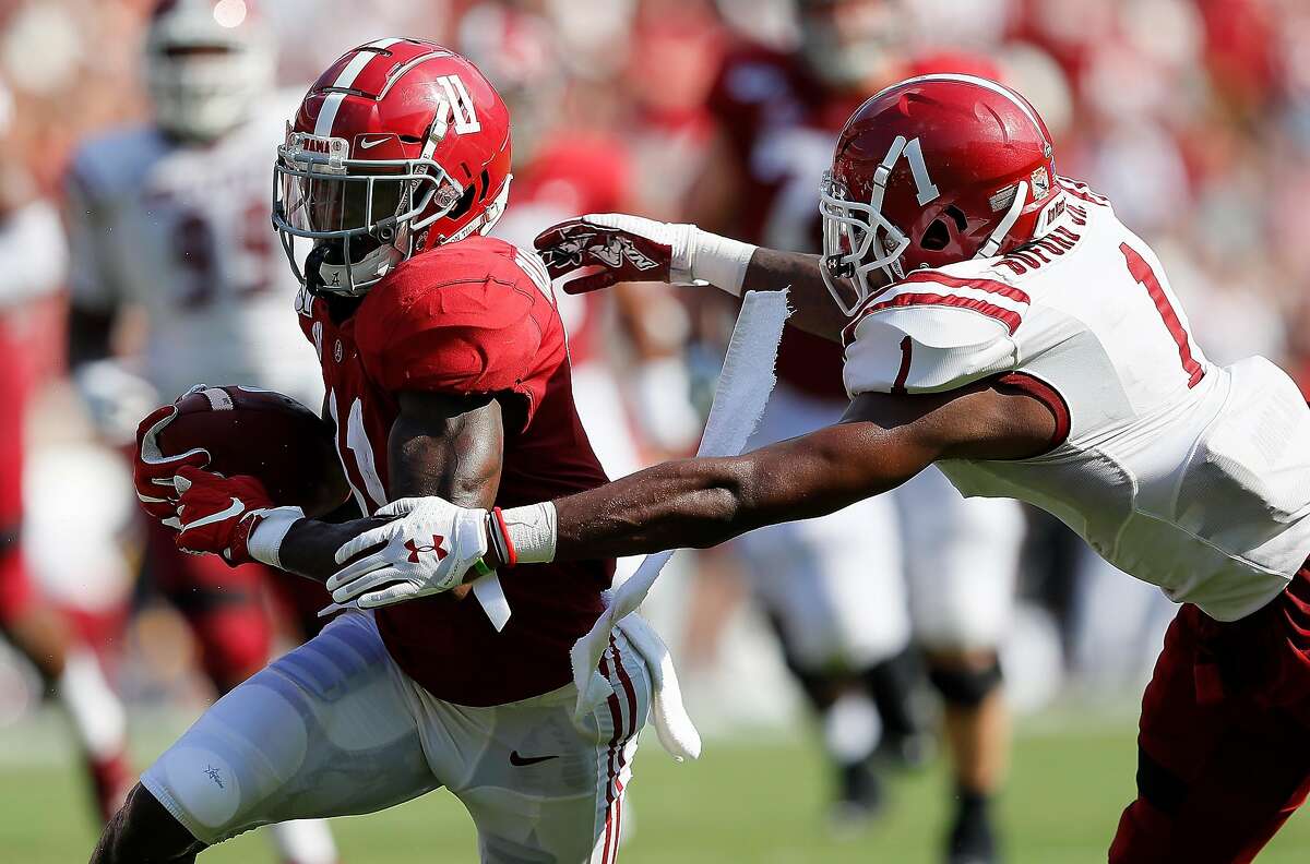 FILE: 2020 NFL Draft Top Prospects - Wide Receivers. TUSCALOOSA, ALABAMA - SEPTEMBER 07: Henry Ruggs III #11 of the Alabama Crimson Tide pulls in this reception against Ray Buford Jr. #1 of the New Mexico State Aggies at Bryant-Denny Stadium on September 07, 2019 in Tuscaloosa, Alabama. (Photo by Kevin C. Cox/Getty Images)