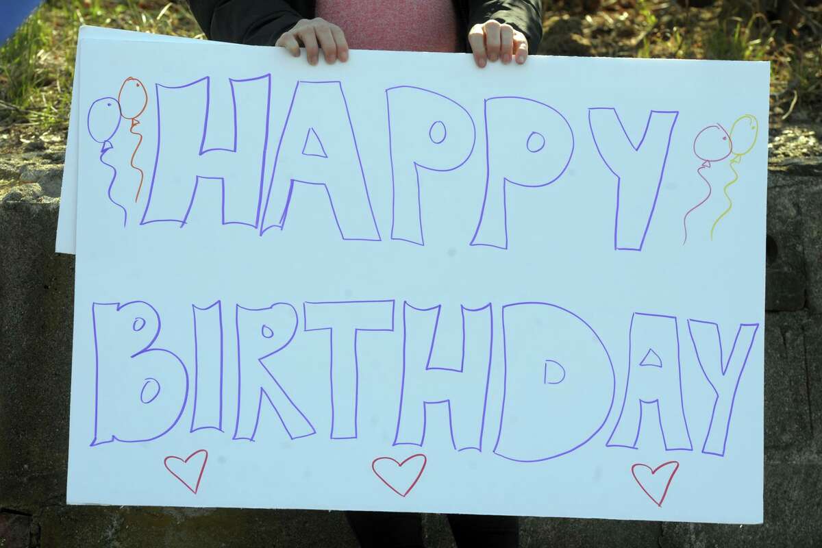 A truck from Oak Ridge Waste and Recycling delivered presents and balloons to Isabella Stevens on her 2nd birthday.
