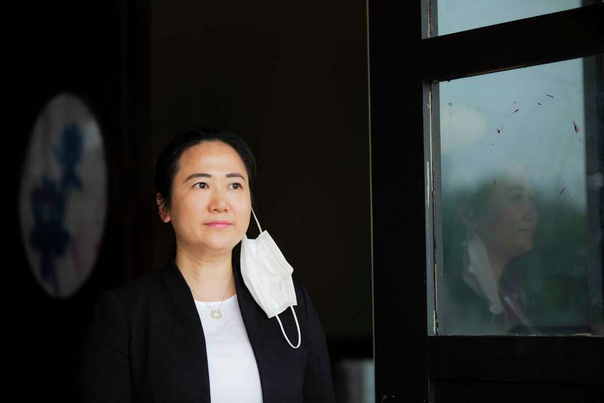 Yunan Yang, founder of Pepper Twins on Sunday, April 19, 2020, in Houston. Yang has been storing protective masks at her restaurant for first responders and medical professionals.