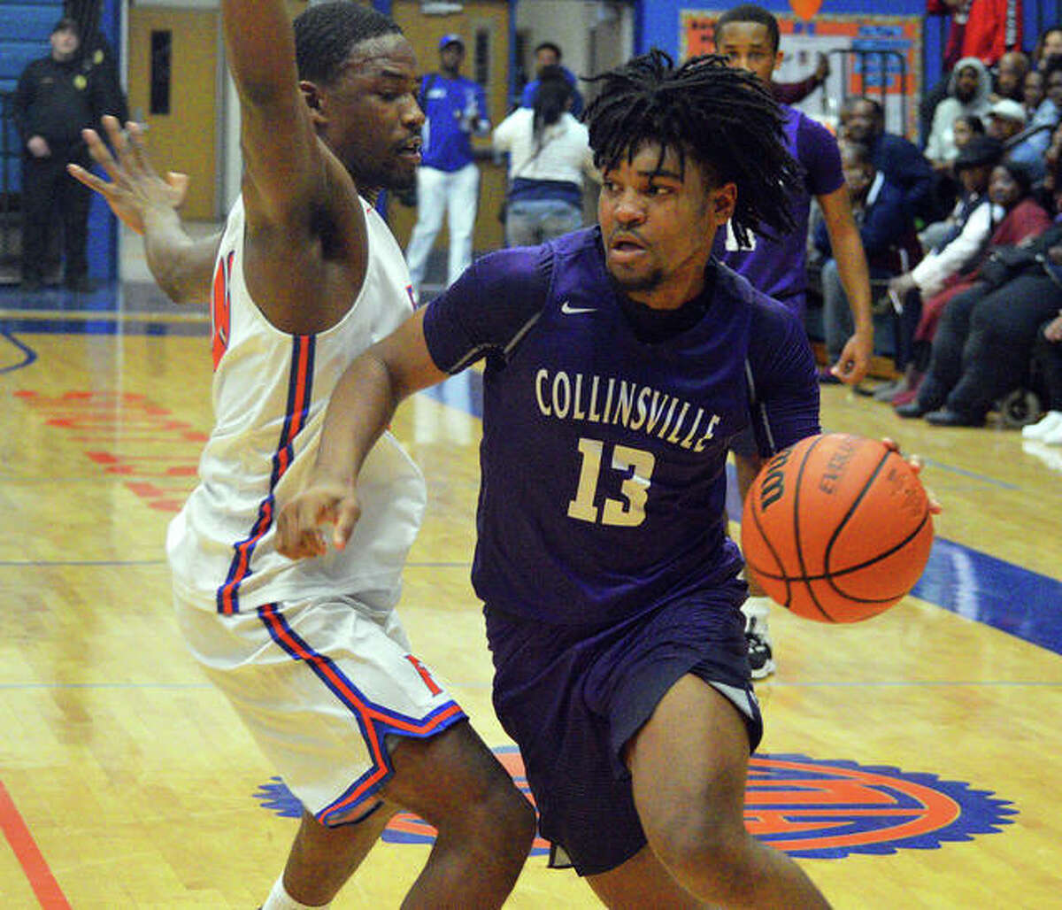 Collinsville guard Ray’Sean Taylor drives to the basket during a game at East St. Louis this season.