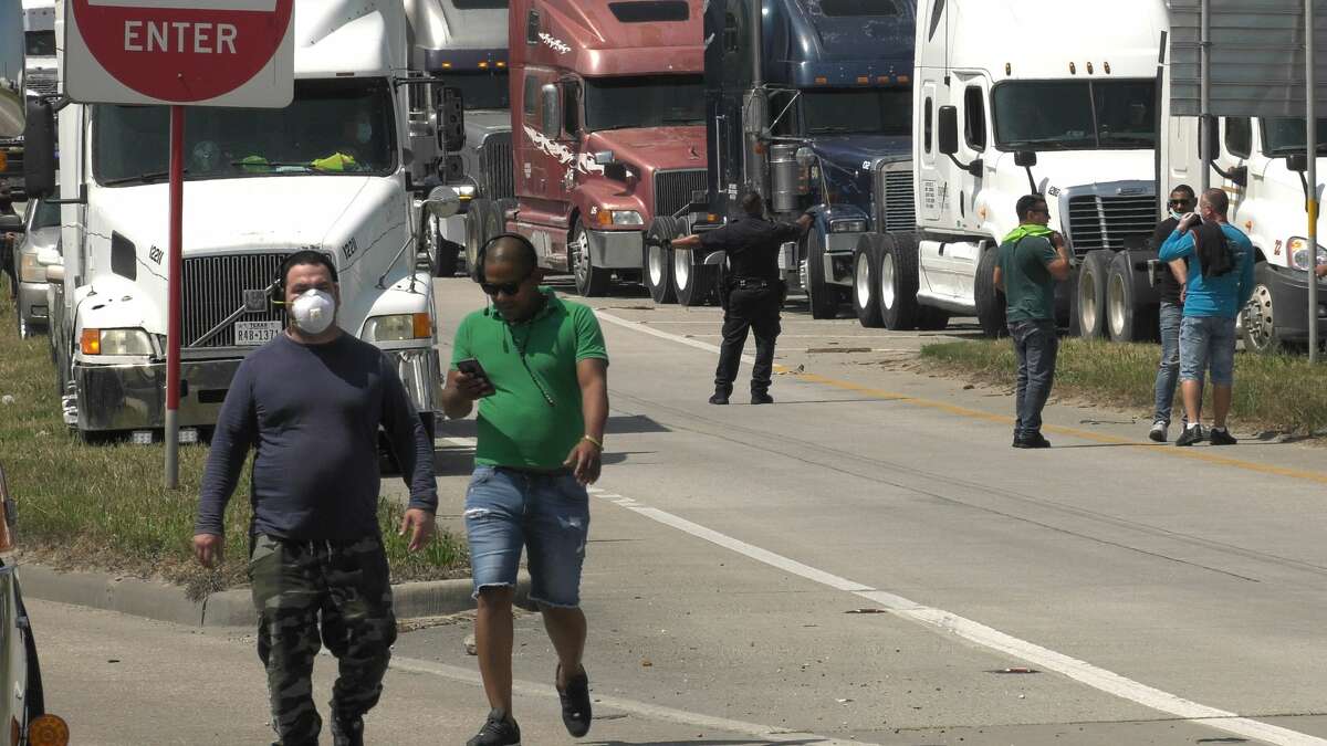 A group of truckers block part of the North Loop near Gellhorn in a protest of some sort Monday, April 20, 2020.