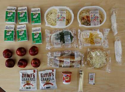 The contents of the food bags being prepared for pickup at SFUSD’s meal delivery at Mission High School.