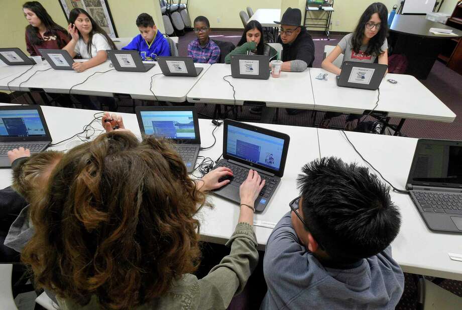 Students learn basic coding during a computer science class on April 4 ,2019 in Stamford. The Beyond Limits Academic Program offers free computer science classes to middle school students. Photo: Matthew Brown / Hearst Connecticut Media / Stamford Advocate