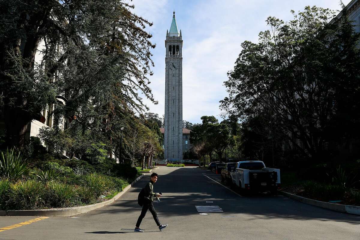A man walks through the UC Berkeley campus a day after Berkeley suspended in-person classes through the end of Spring break due to the coronavirus on Tuesday, March 10, 2020 in Berkeley, California.