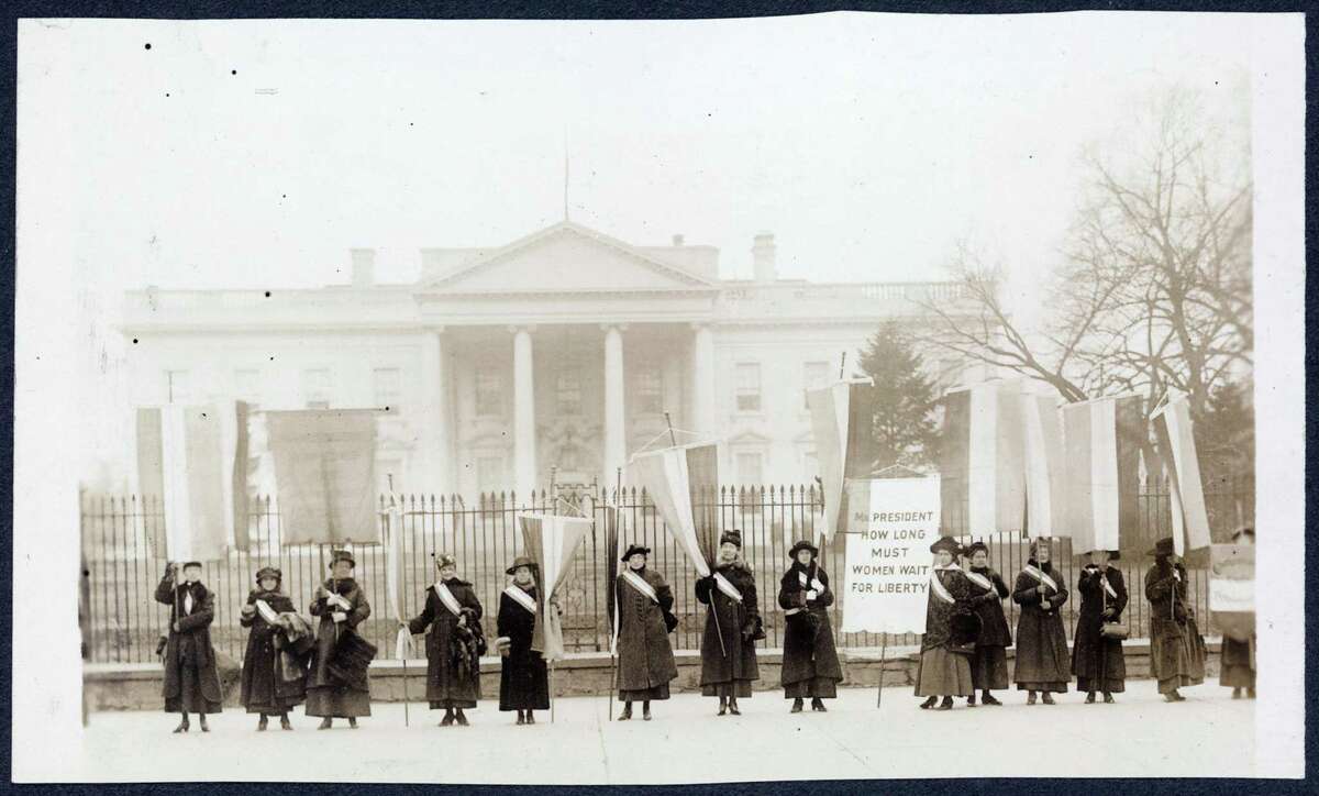 Members of the National Woman's Party picket the White House during the fight for a woman's right to vote.