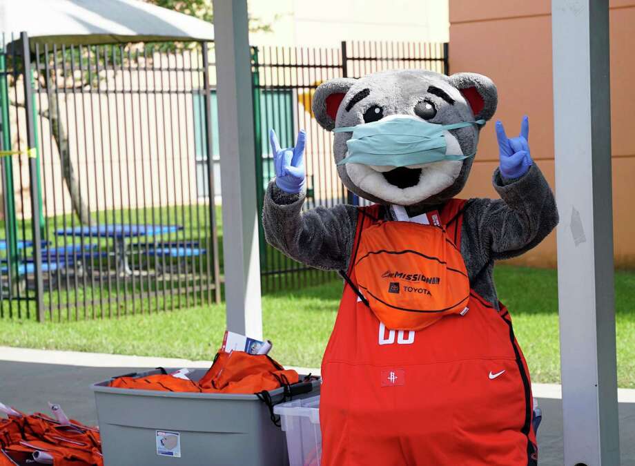 Rockets Mascot joins Boys & Girls Club to donate activity kits