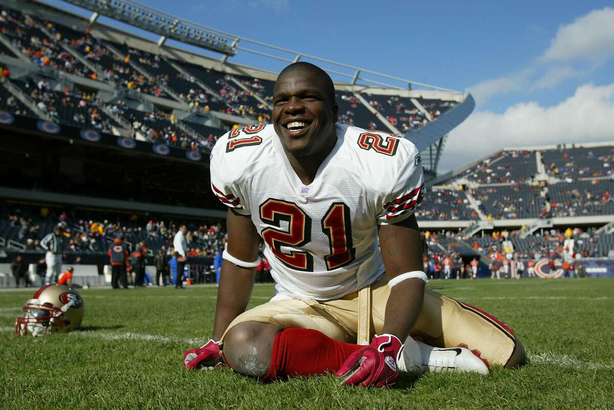 CHICAGO - NOVEMBER 13: Frank Gore #21 of the San Francisco 49ers stretches before the game against the Chicago Bears on November 13, 2005 at Soldier Field in Chicago, Illinois. The Bears defeated the 49ers 17-9. ~~