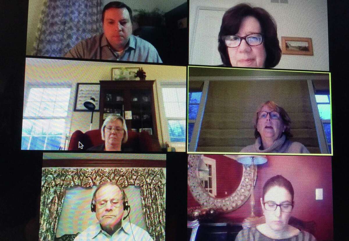 The Wilton Board of Selectmen, clockwise from lower left, Ross Tartell, Deborah McFadden, Josh Cole, Lori Bufano and First Selectwoman Lynne Vanderslice and Chief Financial Officer Ann Kelly-Lenz discuss the budget and tax deferment at a live stream meeting on Tuesday, April 21.