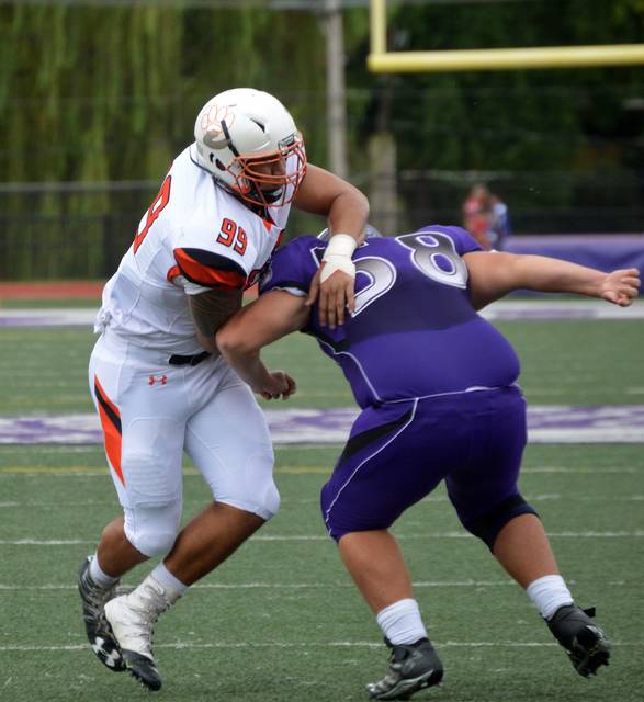 Edwardsville grad A.J. Epenesa declares for NFL Draft