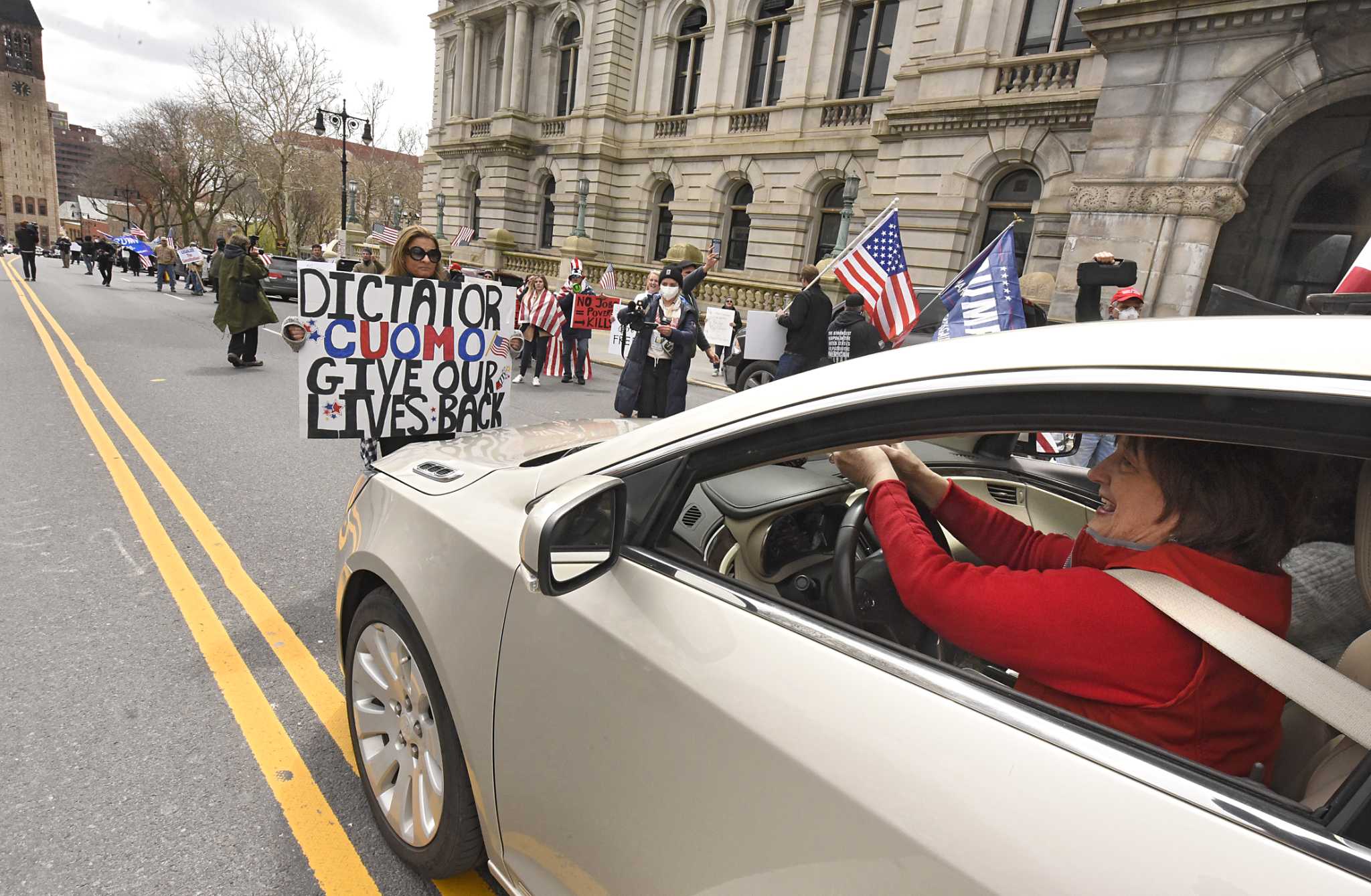 Hundreds gather at the Capitol to protest state shutdown