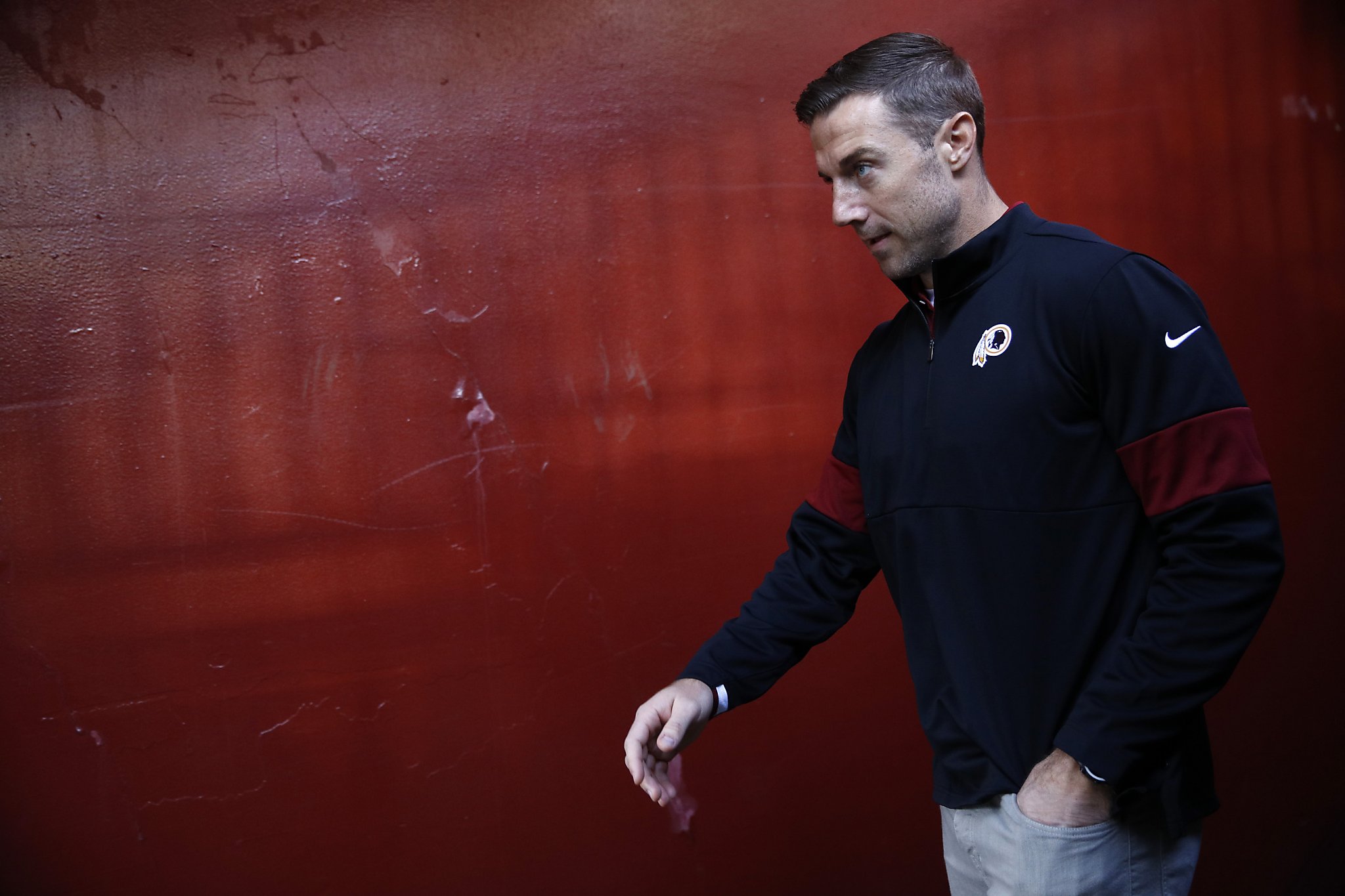 Quarterback Alex Smith of the San Francisco 49ers prepares to throw a