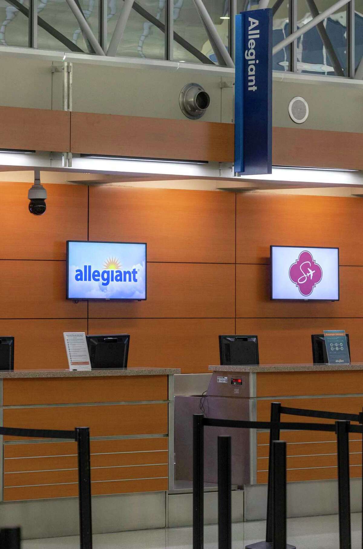The Allegiant airline ticket counter stands empty Wednesday, April 22, 2020 at the San Antonio International Airport. Despite receiving $172 million in federal stimulus money, Allegiant is asking for a waiver from the government to allow it to cut San Antonio service.