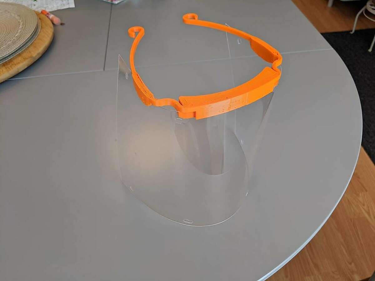 A face shield made by San Mateo County Libraries staff using the library system's 3D printers. The library system plans to produce and distribute hundreds of shields and ear savers to local health care workers.
