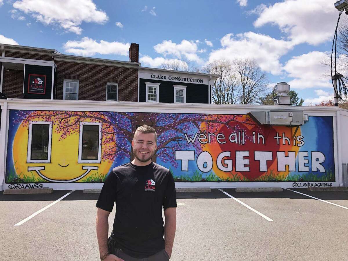 Ross Clark’s upbeat mural is easily visible to southbound drivers on Route 7 in Branchville.