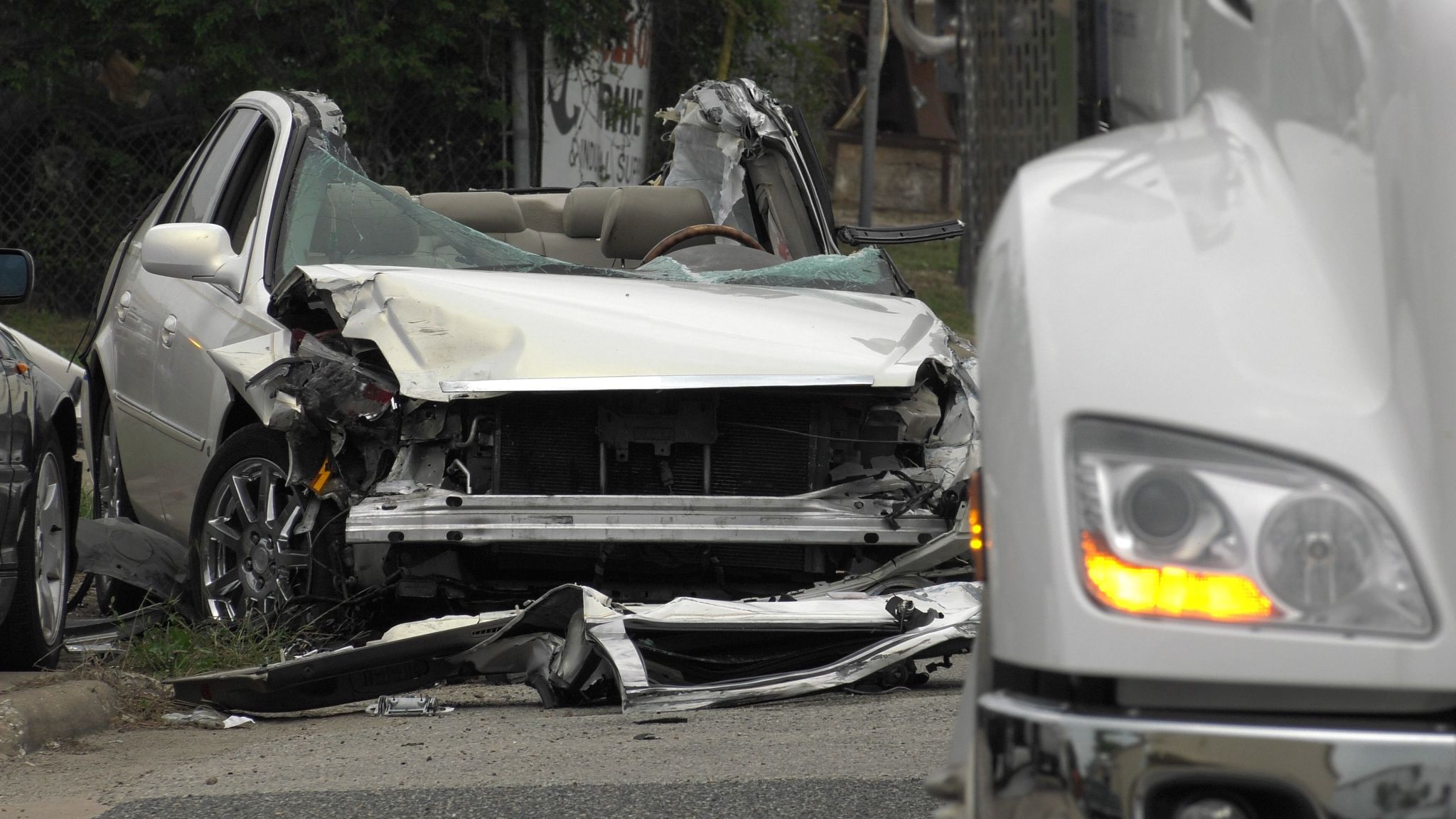 Cadillac driver killed trying to pass 18-wheeler in southeast Houston