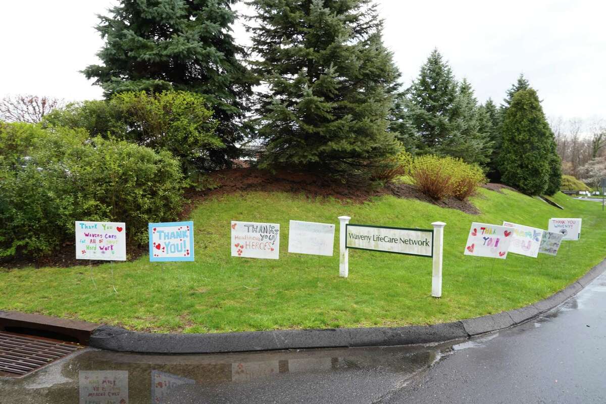 Signs of the times: More than 30 thank yous to health care workers are flanking the driveways of the Waveny LifeCare Network on Farm Road, in New Canaan.