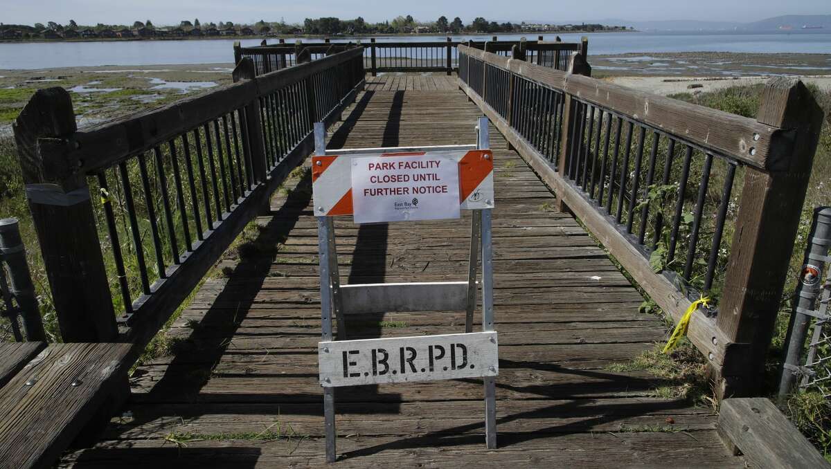 A platform for bird viewing is shut down until further notice Wednesday, April 22, 2020, at the Elsie B. Roemer Bird Sanctuary at Robert W. Crown Memorial State Beach in Alameda, Calif.