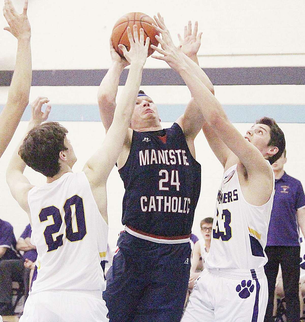Manistee Catholic Central's Kyle Mikolajczak was named among the state's best Division 4 basketball players by the Basketball Coaches Association of Michigan. (News Advocate file photo)