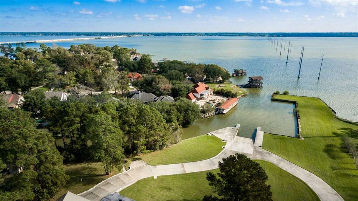 5M waterfront Lake Houston home offers its own private boat harbor
