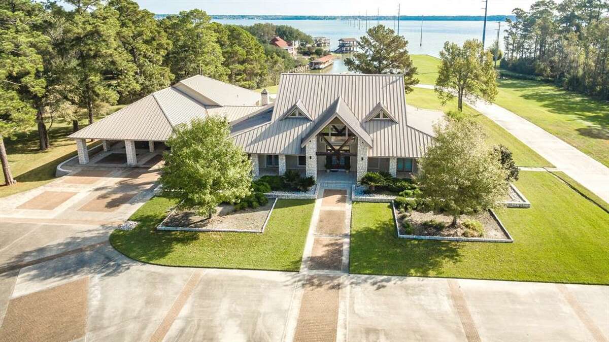 5M waterfront Lake Houston home offers its own private boat harbor