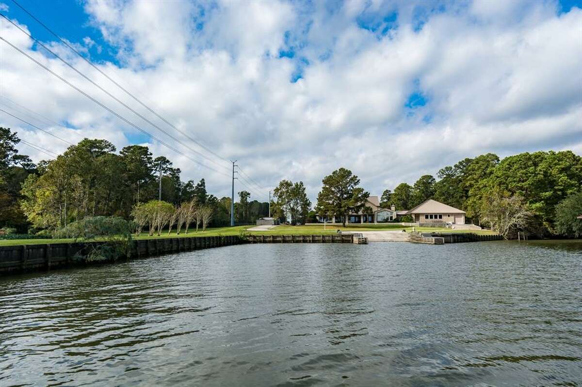 5M waterfront Lake Houston home offers its own private boat harbor