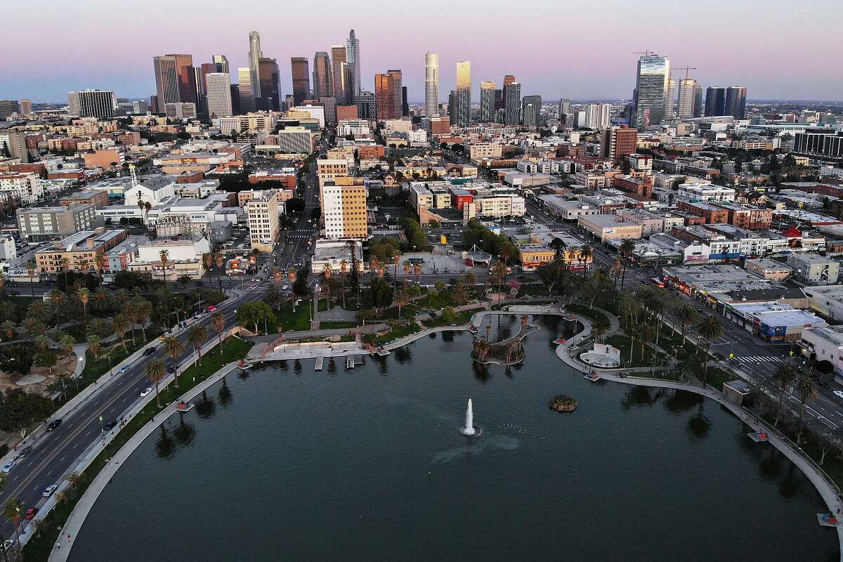 An aerial view shows MacArthur Park and downtown Los Angeles in the midst of the coronavirus pandemic, on April 15, 2020 in Los Angeles, California. Emissions have dropped enough to provide a rare, clear view in Southern California.