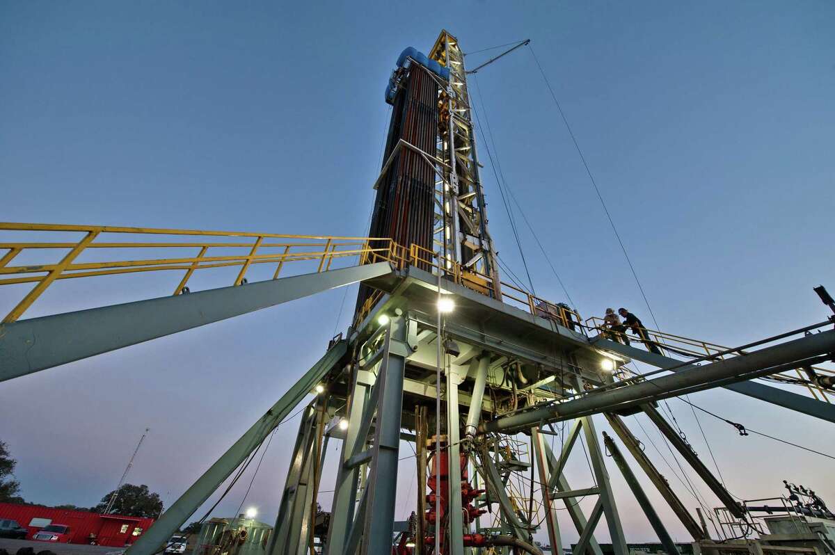 An oil & gas drilling rig stands tall in the Eagle Ford shale.