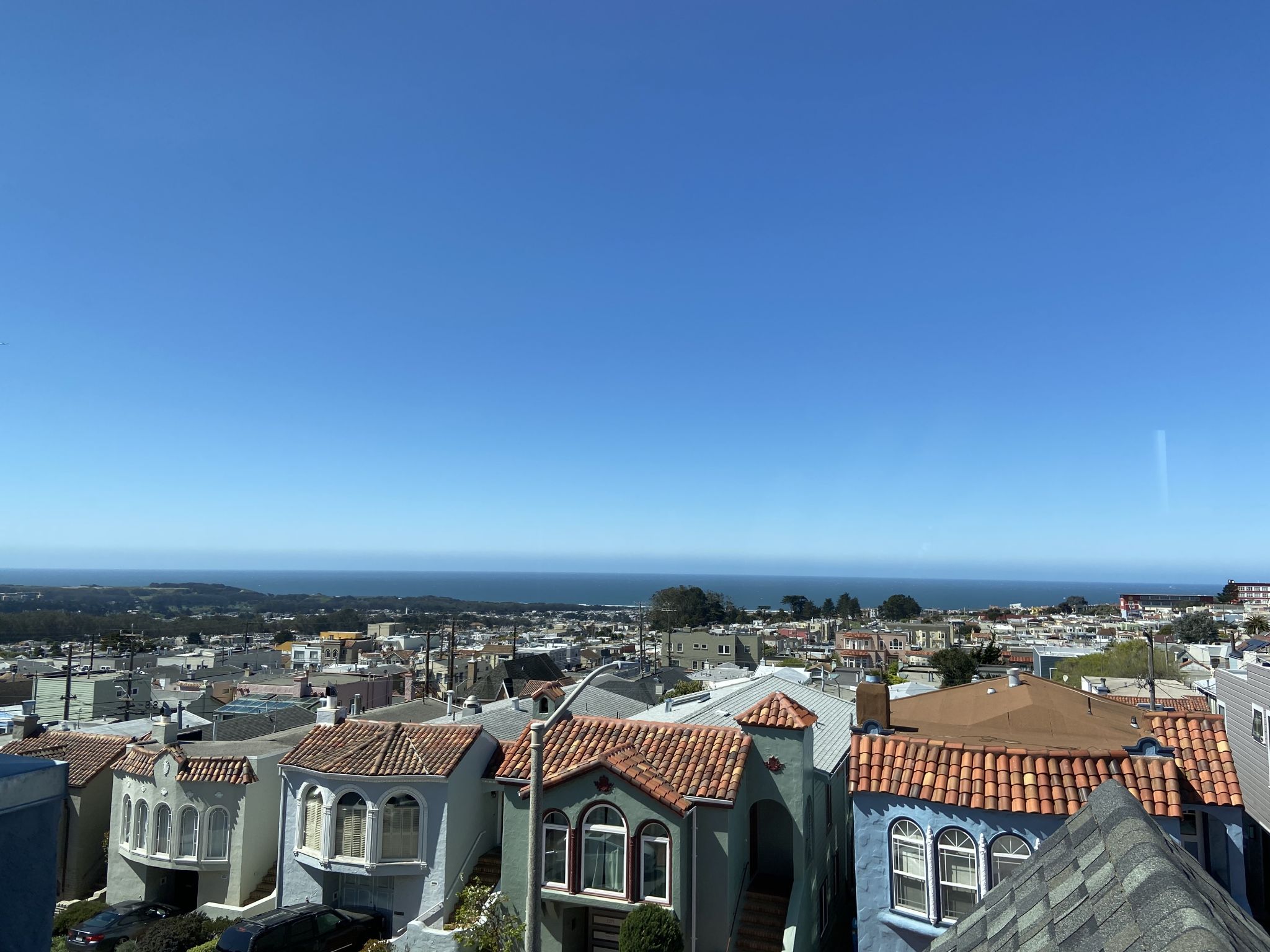 Stuck inside during quarantine? This home takes you outside with sweeping views across the Sunset neighborhood to the sea.