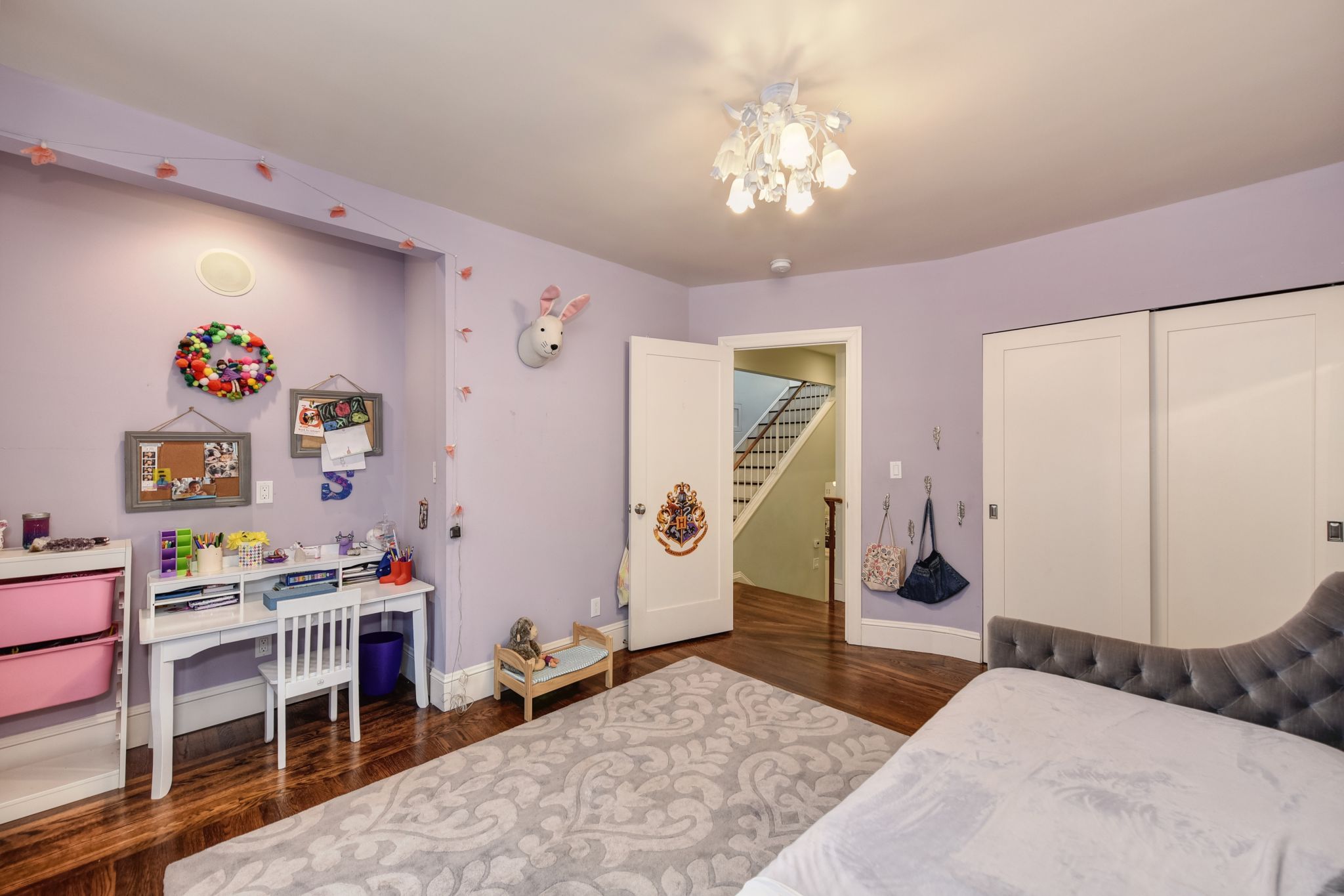 The two additional bedrooms overlook the garden and feature large closets with organizers.
