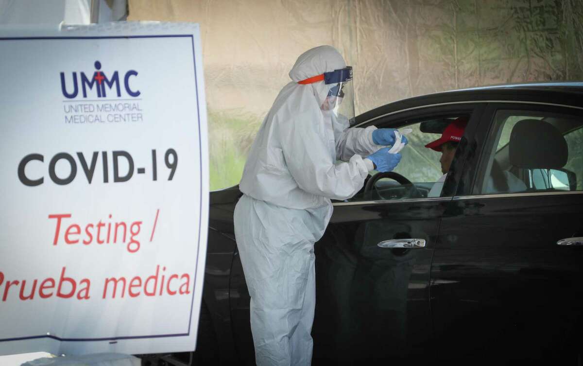 A person gets tested at a COVID-19 testing site located at 7525 Tidwell Friday, April 24, 2020, in Houston.
