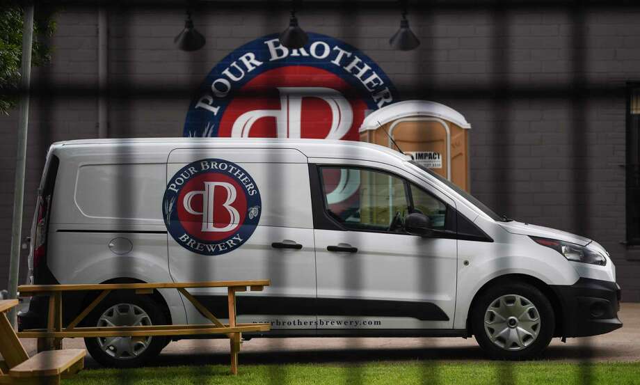 A van with the Pour Brothers Brewery's logo outside the front of the brewery Tuesday. Photo taken on Monday, 09/09/19. Ryan Welch/The Enterprise Photo: Ryan Welch, Beaumont Enterprise / The Enterprise / © 2019 Beaumont Enterprise