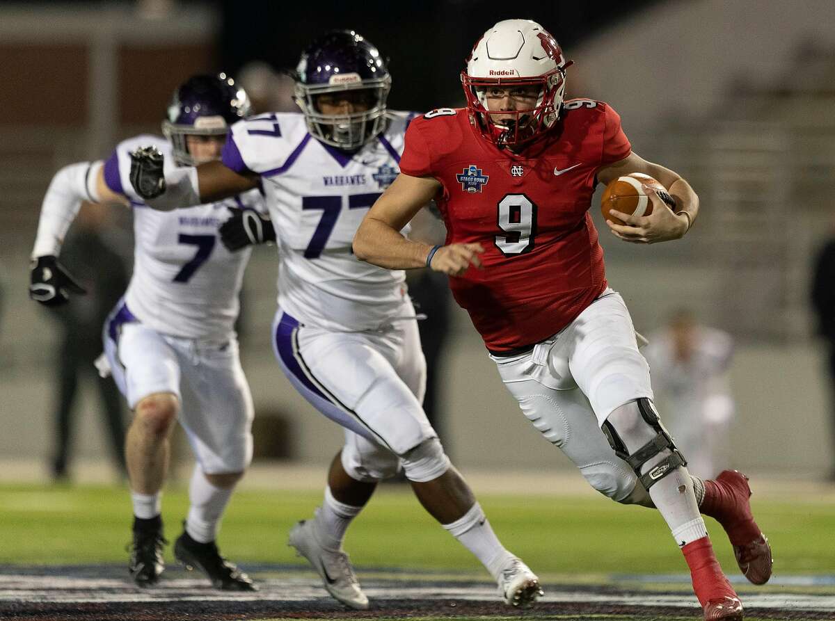 North Central College quarterback Broc Rutter (9) runs past Wisconsin-Whitewater defensive linemen Jermaine Copeland (77) during the second quarter of the NCAA Division III college football championship at Woodforest Bank Stadium, Friday, Dec. 20, 2019, in Shenandoah.