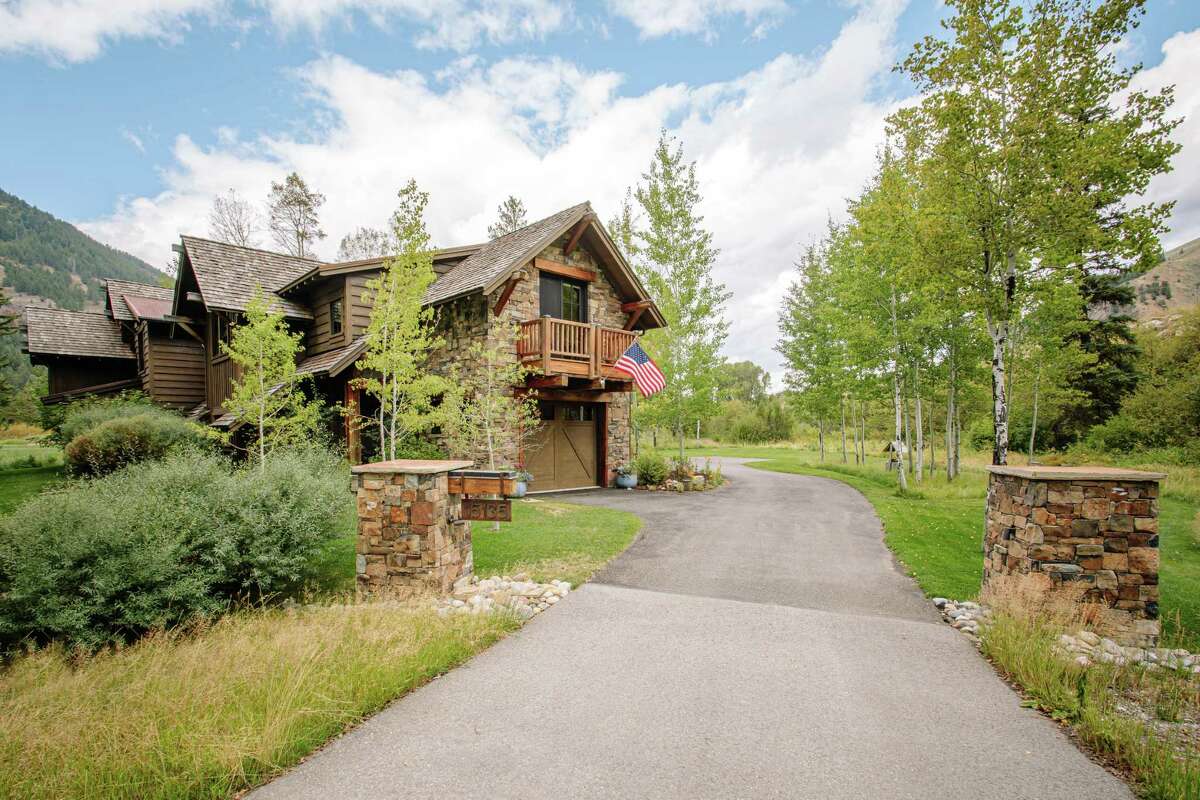 The four-bedroom, four-and-a-half-bathroom at 15135 Martin Creek Road in Jackson, Wyoming features an open floor plan and direct access to the Snake River.