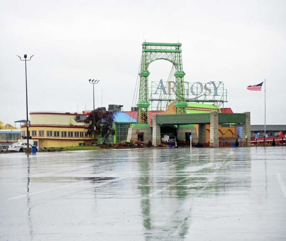 FILE - The empty parking lot of the Argosy Casino in Alton is a surreal scene as pandemic stay-at-home orders have made tourism “the frontline of the economic downfall.”