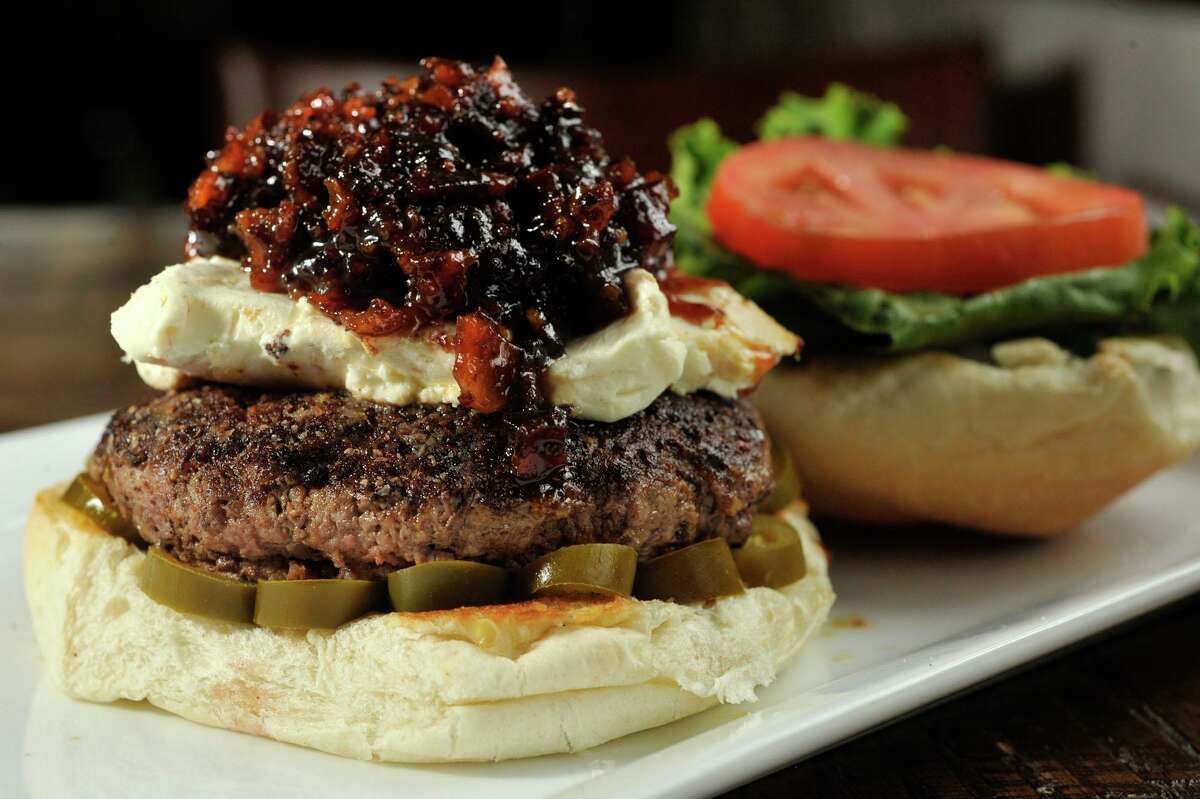 Customers who place orders of $15 or more at restaurants in Wilton can win gift certificates. Photo: Burger at Little Pub in Wilton.