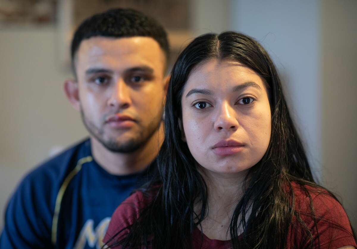 Undocumented immigrant Juana, 24, from El Salvador and her husband Saul, 23, from Honduras sit in their one-room apartment on March 25, 2020 in Norwalk, Connecticut. Juana lost her job as a house cleaner and Saul as a painter due to the coronavirus (COVID-19) pandemic. Undocumented immigrants cannot collect unemployment. Nor will they benefit from federal government bailout legislation.