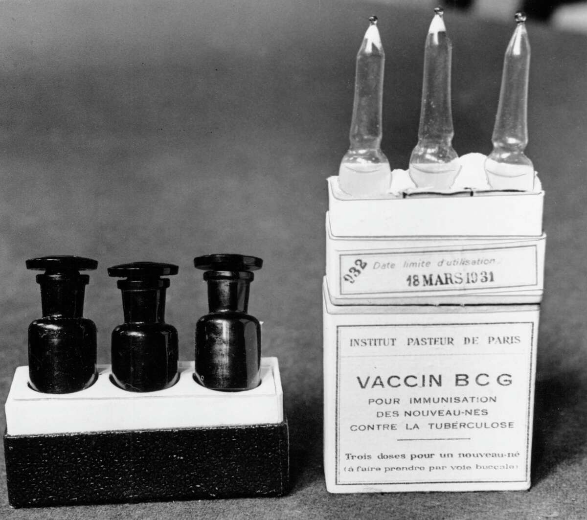 Scientists are dusting off some decades-old vaccines against TB and polio to see if they could provide stopgap protection against COVID-19 until a more precise shot arrives.This March 1931 file photo shows ampules of the BCG vaccine against tuberculosis in a laboratory at the Institute Pasteur in Paris, France.