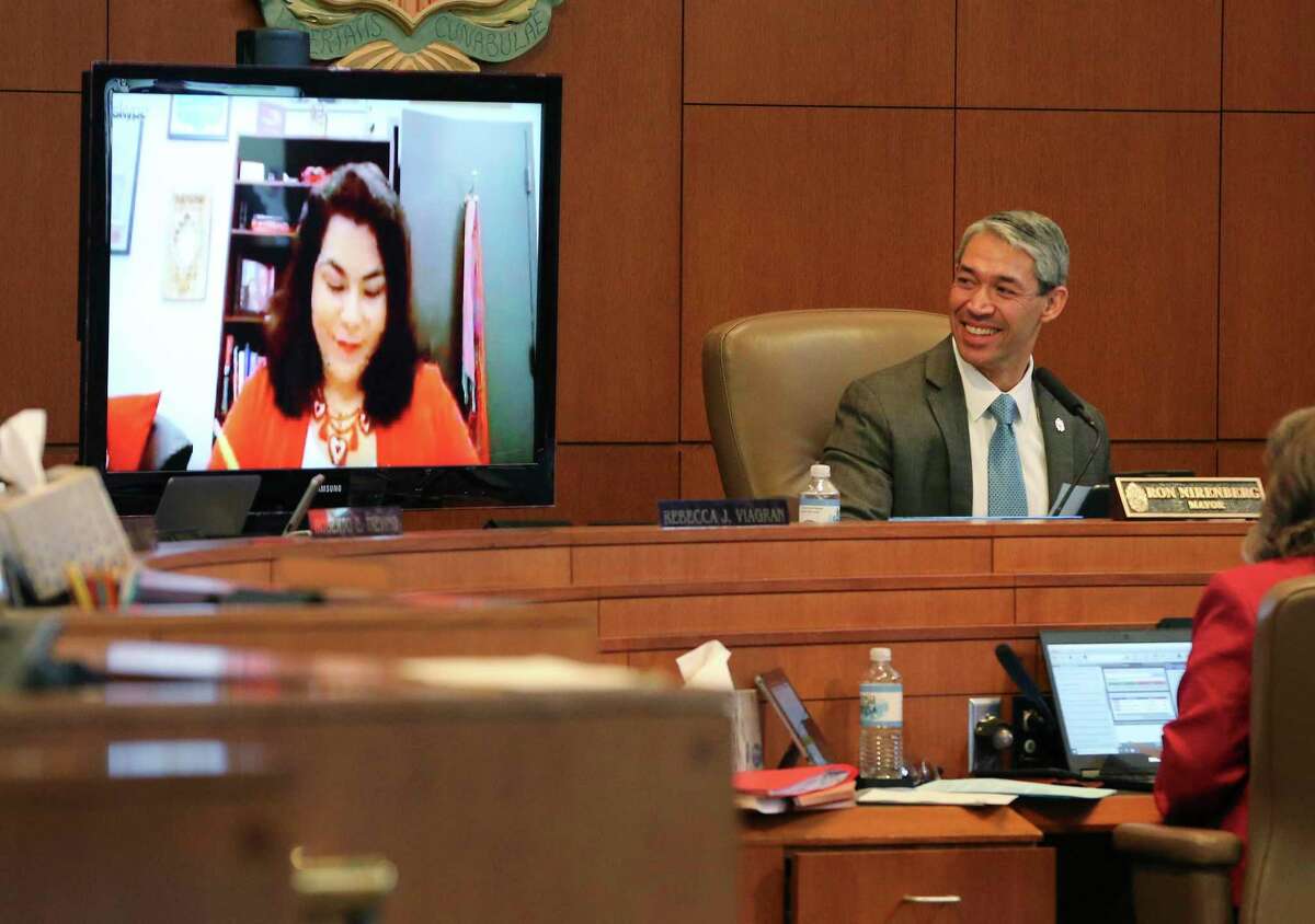 In a lighter moment, Mayor Ron Nirenberg chuckles as the video chat with District 3 Councilwoman Rebecca Viagran stalls during the San Antonio City Council meeting on Thursday, Apr. 16, 2020. The continued discussions of the impact of the Coronavirus pandemic on the city was held by council members and city staff.